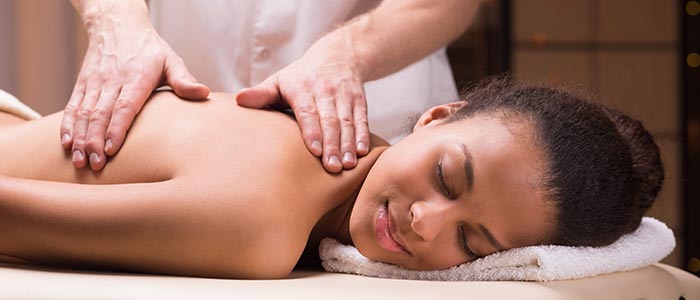 Chiropractic Lake Odessa MI Woman Receiving Massage Therapy
